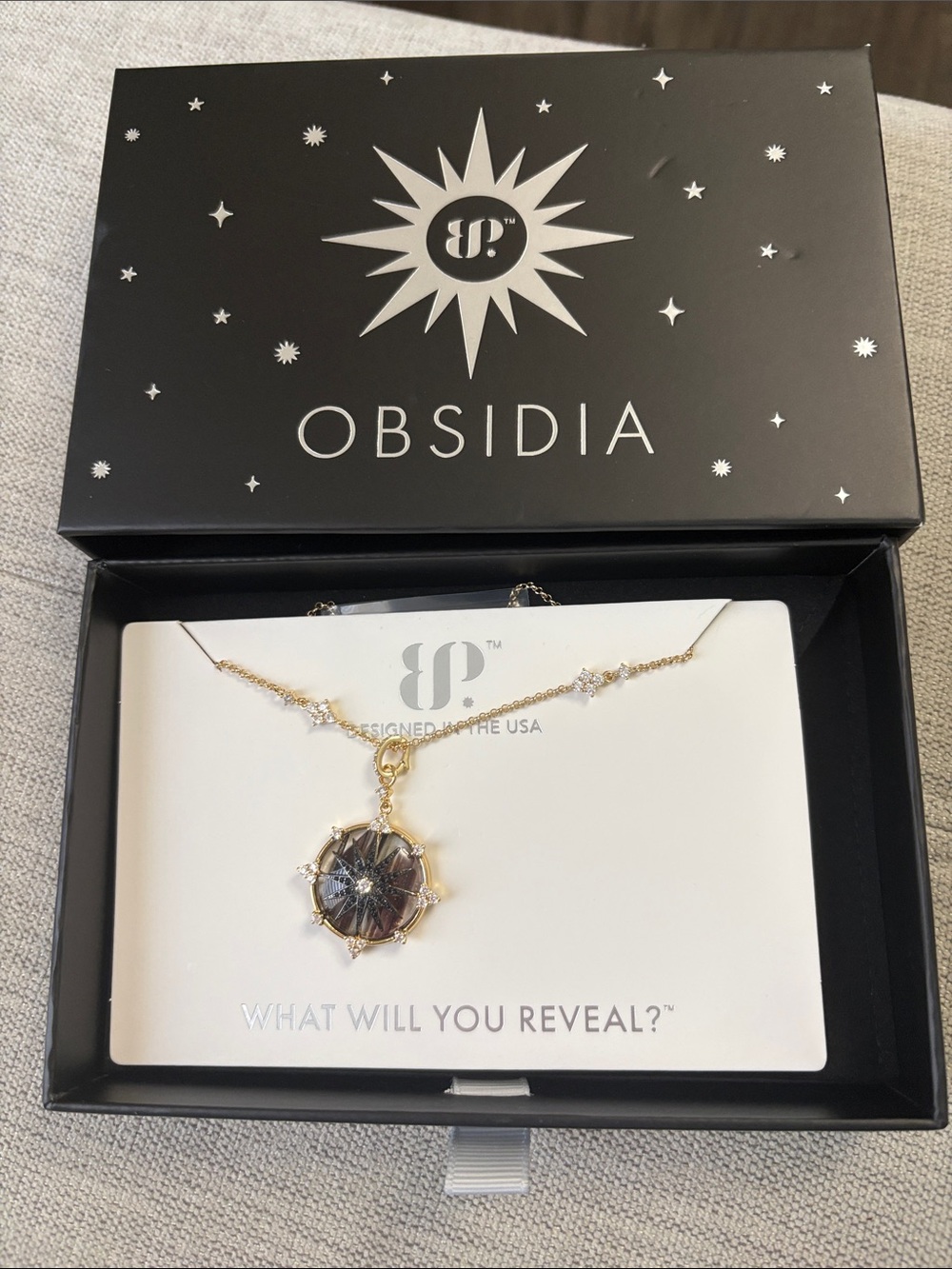 Obsidia Gold Necklace with Dark Faceted Pendant